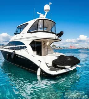 Family enjoying swimming and wildlife from the C Weed yacht swim platform