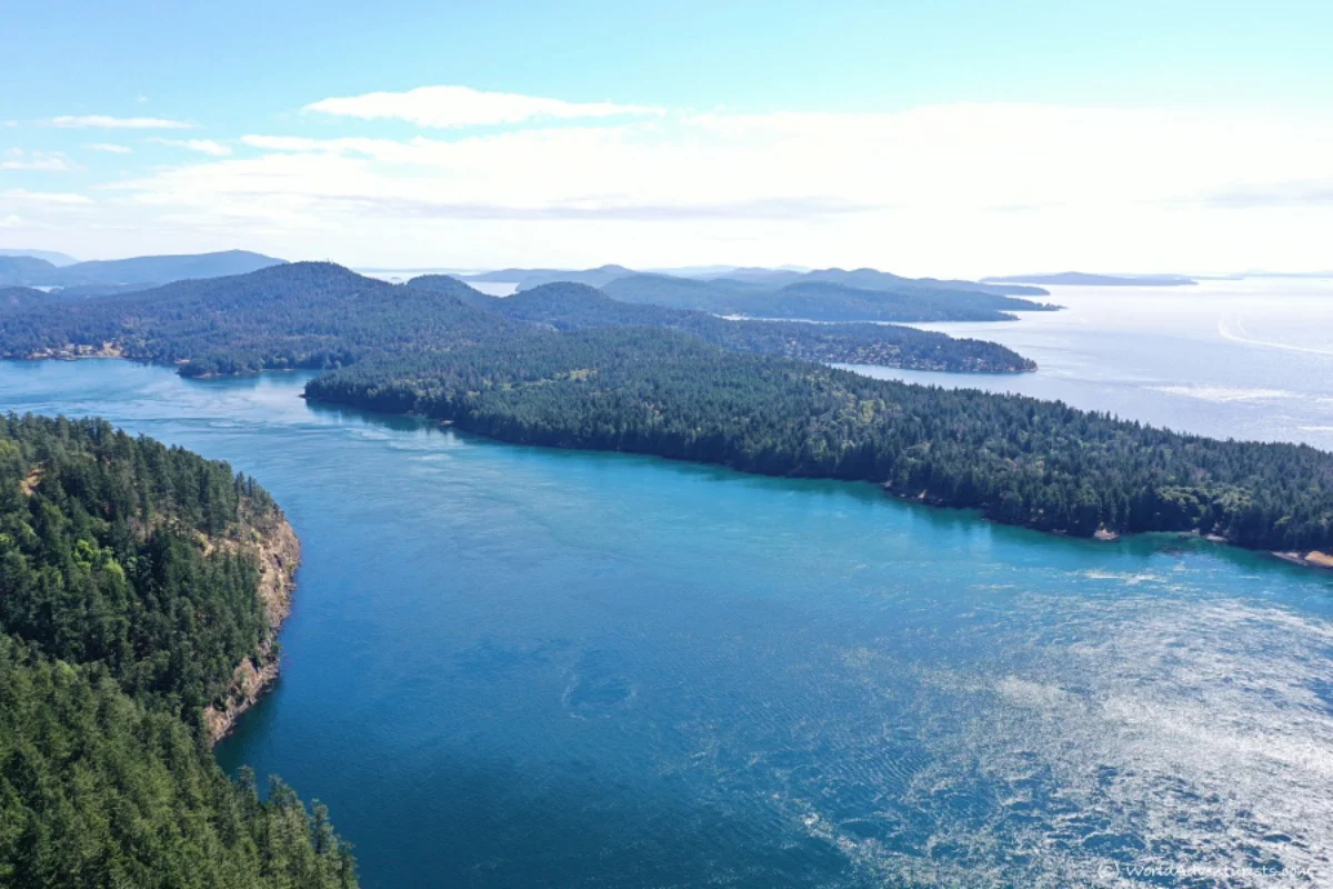 Galiano Island sandstone bluffs and coastline viewed from a private charter yacht BC